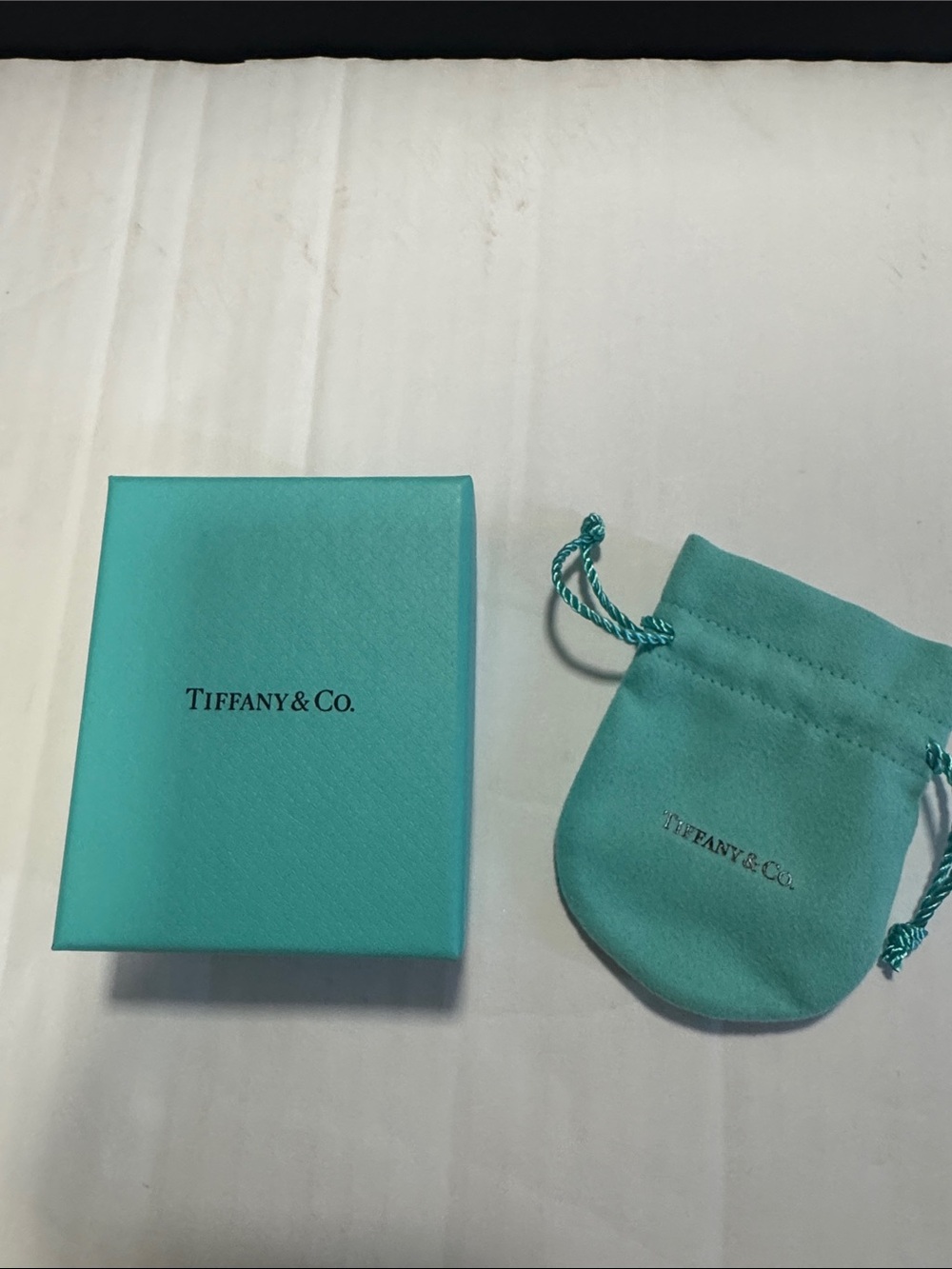 Tiffany & Co. Robin's Egg Blue Jewelry Box and Drawstring Pouch.